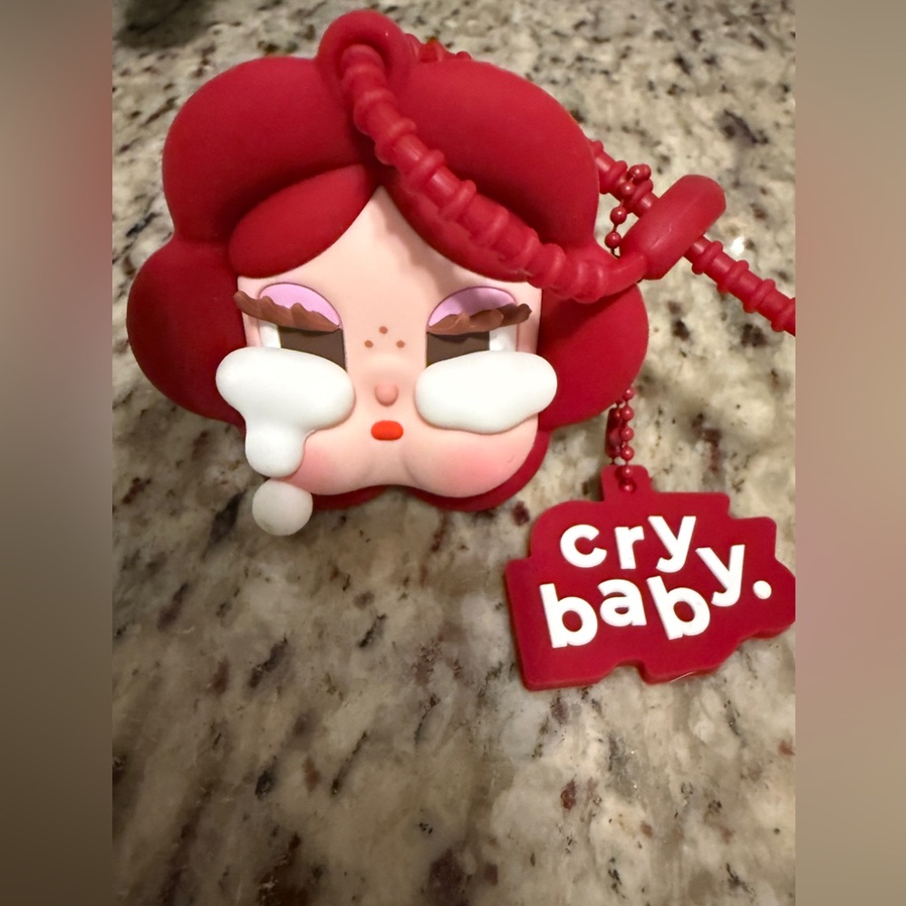 Pop Mart Crybaby Crying for Love Rose Pendant, a limited edition collectible